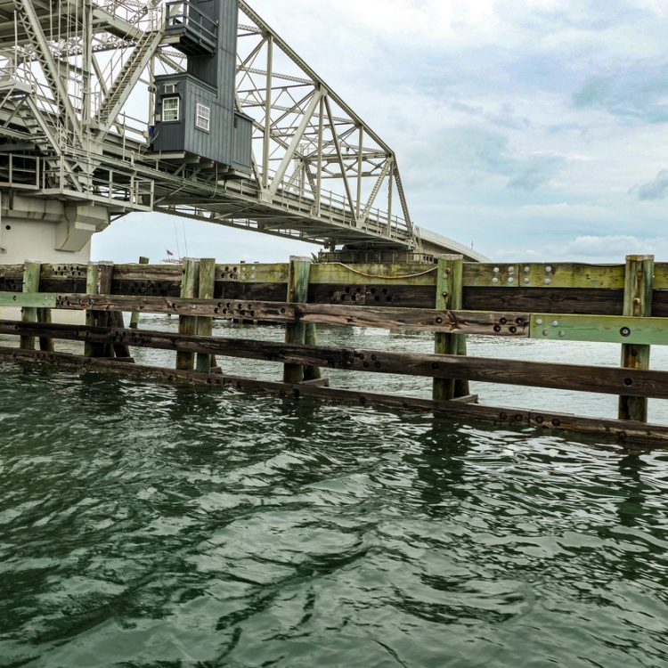 Figure 8 Island bridge in Wilmington North Carolina on a stormy day by boat waiting for the bridge opening call to operate